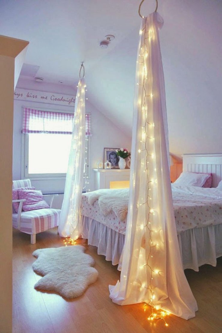 fairy lights with curtains in a girly room