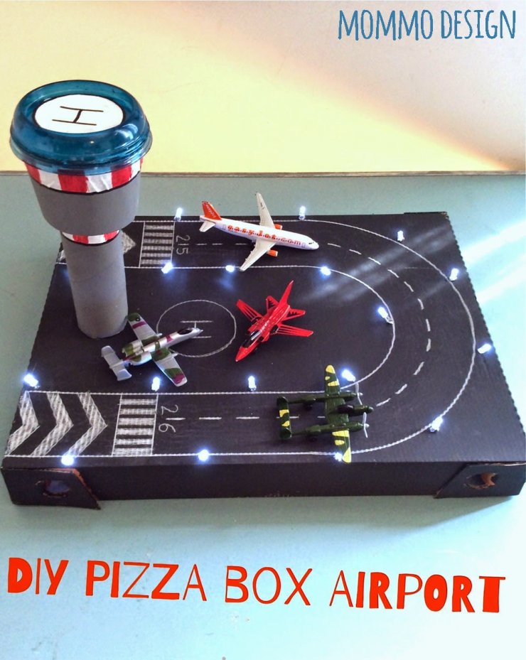 pizza box recycled in a toy airport