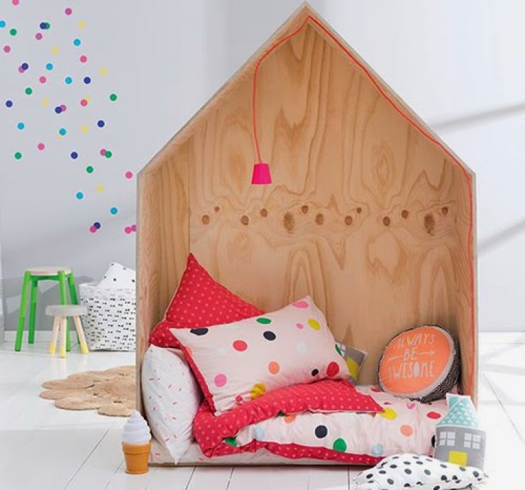 little wooden house as reading nook for kids