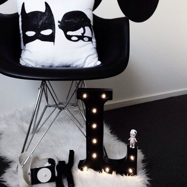 black L marquee sign in kids' room