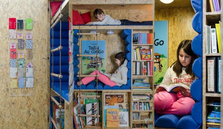 wardrobe hiding a reading nook for kids