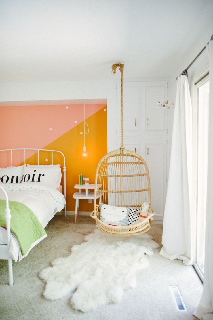 pink and yellow wall in a girls room